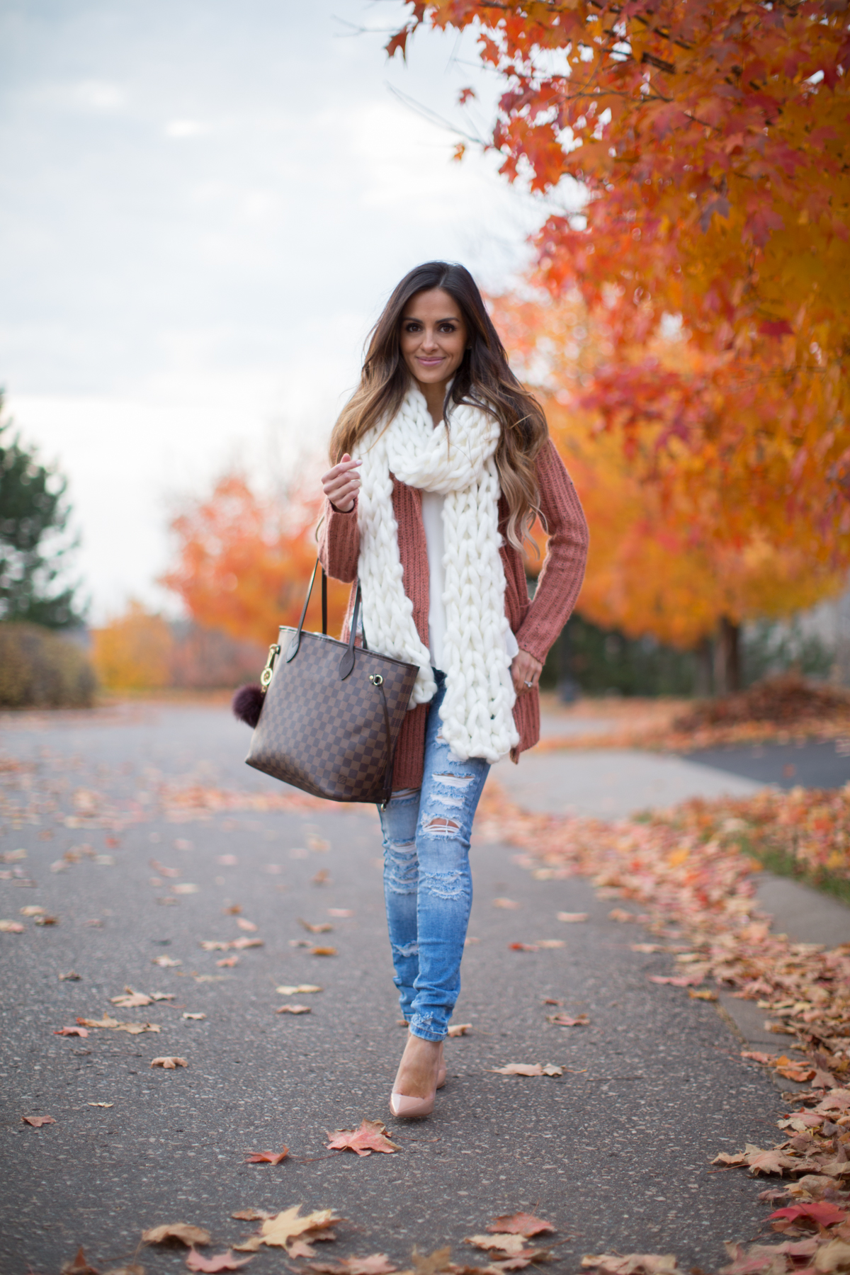 Louis Vuitton Fashion bag, scarf, brown jumper, jeans. Fall autumn