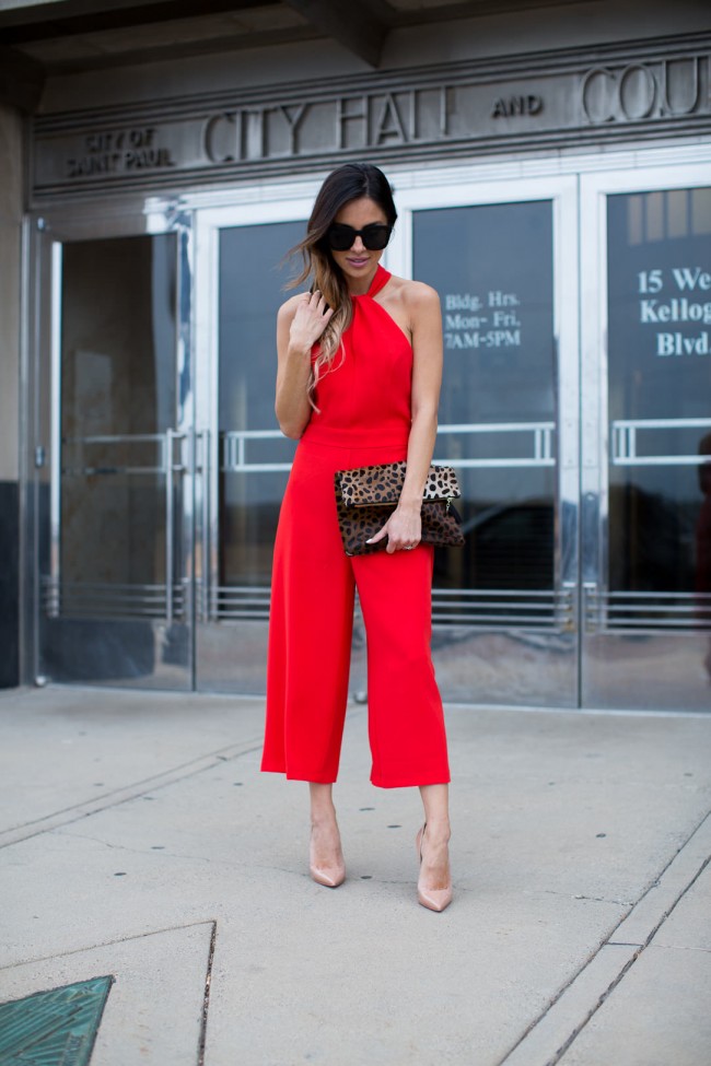 fashion blogger wearing red jumpsuit