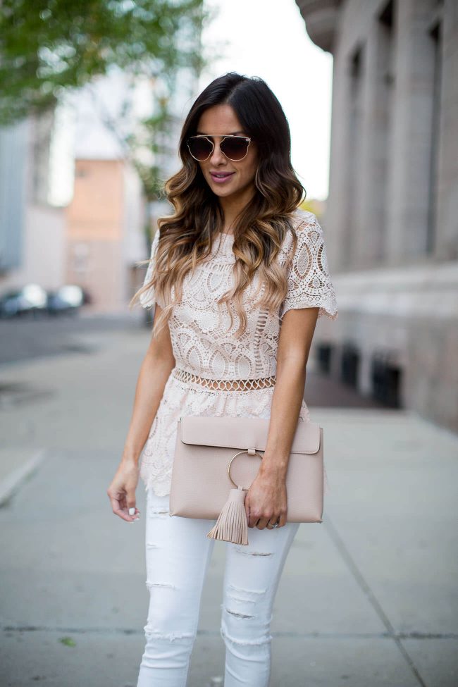 fashion blogger mia mia mine in a pink lace top and pink tassel bag from asos