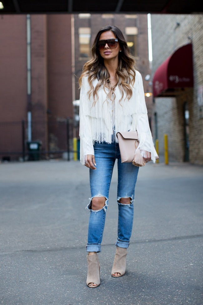 Mia Mia Mine fashion blogger wearing Levi's jeans and a fringe jacket