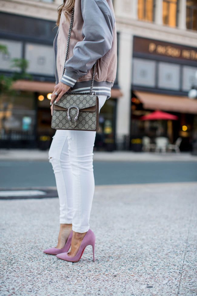 fashion blogger mia mia mine carrying a gucci dionysus bag