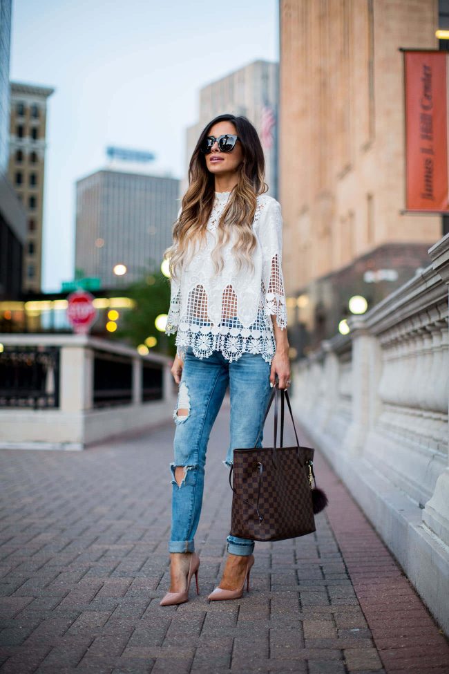 minneapolis fashion blogger mia mia mine in a white lace top and louis vuitton handbag