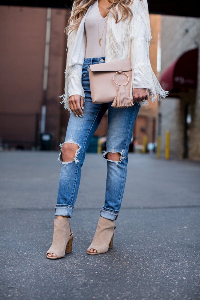 Mia Mia Mine wearing levi's jeans and sole society boots