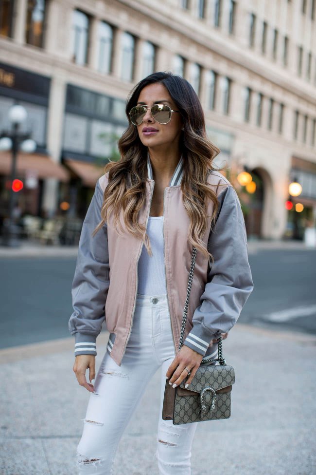 mia mia mine fashion blogger wearing a pink bomber jacket