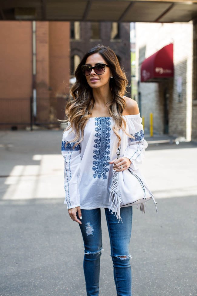 fashion blogger mia mia mine wearing a boho off-the-shoulder top by madewell