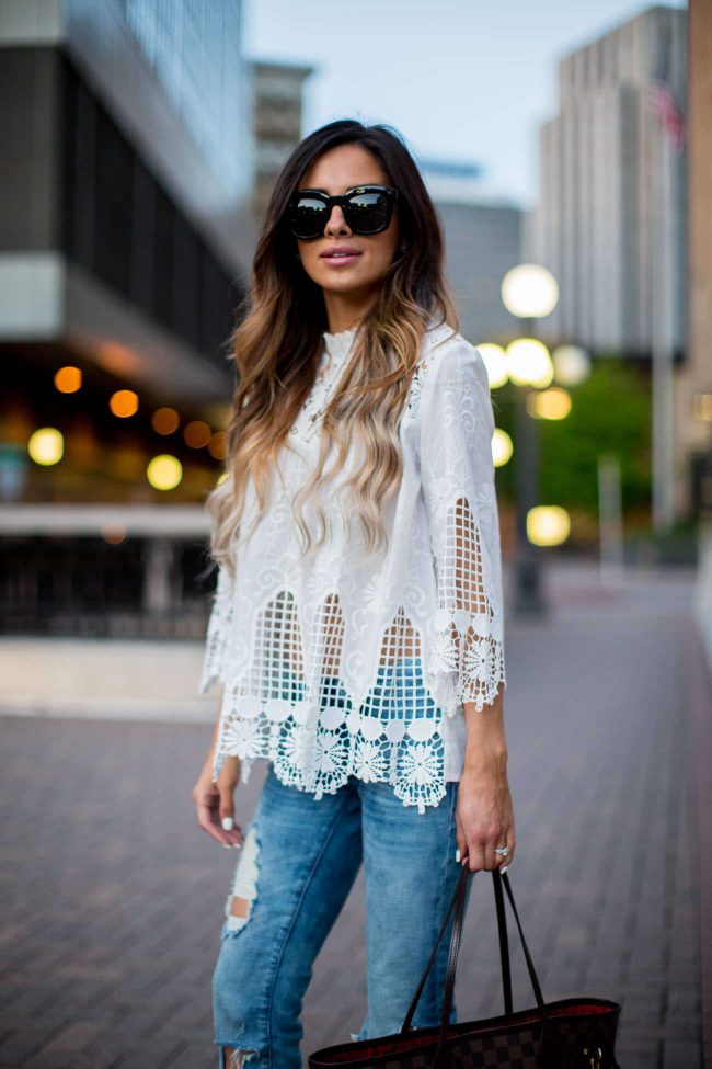 fashion blogger mia mia mine in a white lace top from shopbop and free people sunglasses