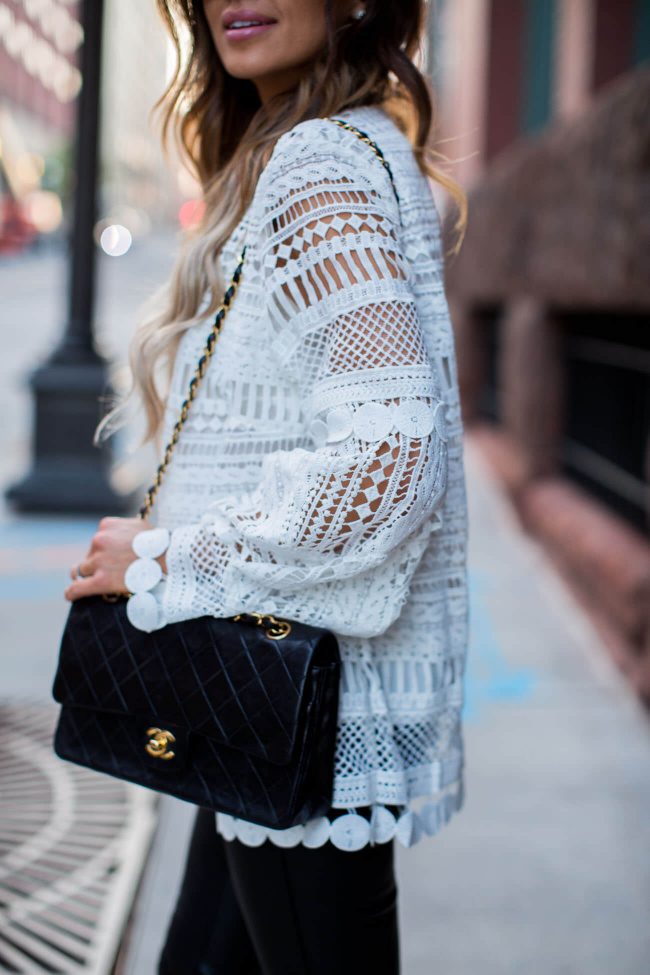 fashion blogger mia mia mine wearing a white lace top from shopbop