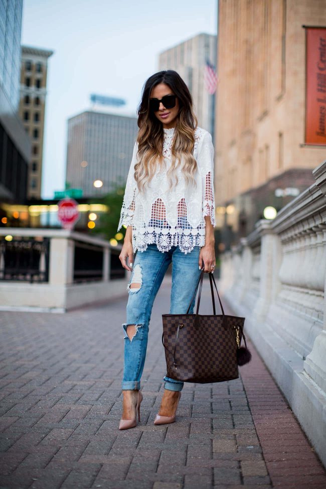 fashion blogger mia mia mine in a white lace top from shopbop and blanknyc jeans
