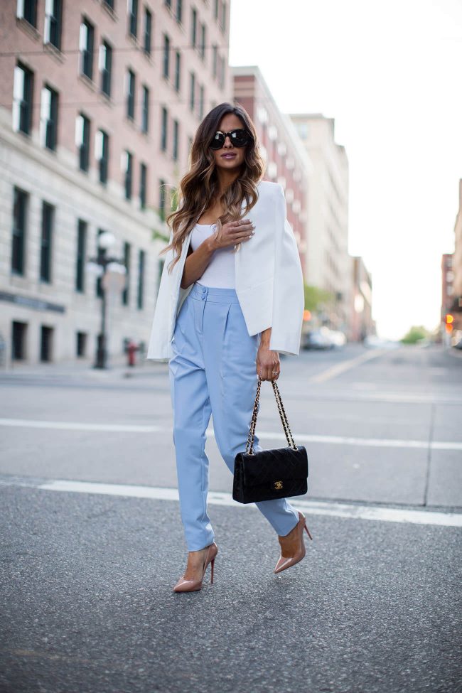 fashion blogger maria vizuete wearing blue pants from asos and a white blazer from topshop