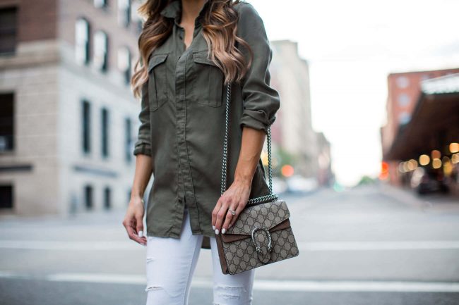 mn fashion blogger mia mia mine in a military top and white jeans from topshop