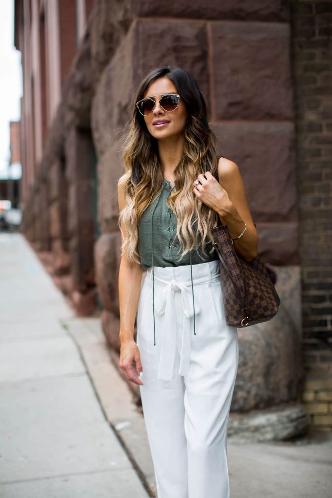 fashion blogger mia mia mine in an olive lace-up top from nordstrom 