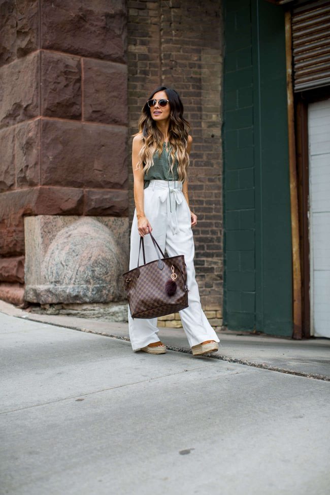 minnesota fashion blogger mia mia mine in an olive tank top from nordstrom and white trousers