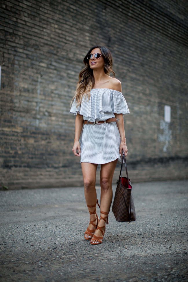 fashion blogger mia mia mine in a striped summer dress and lace-up heels 
