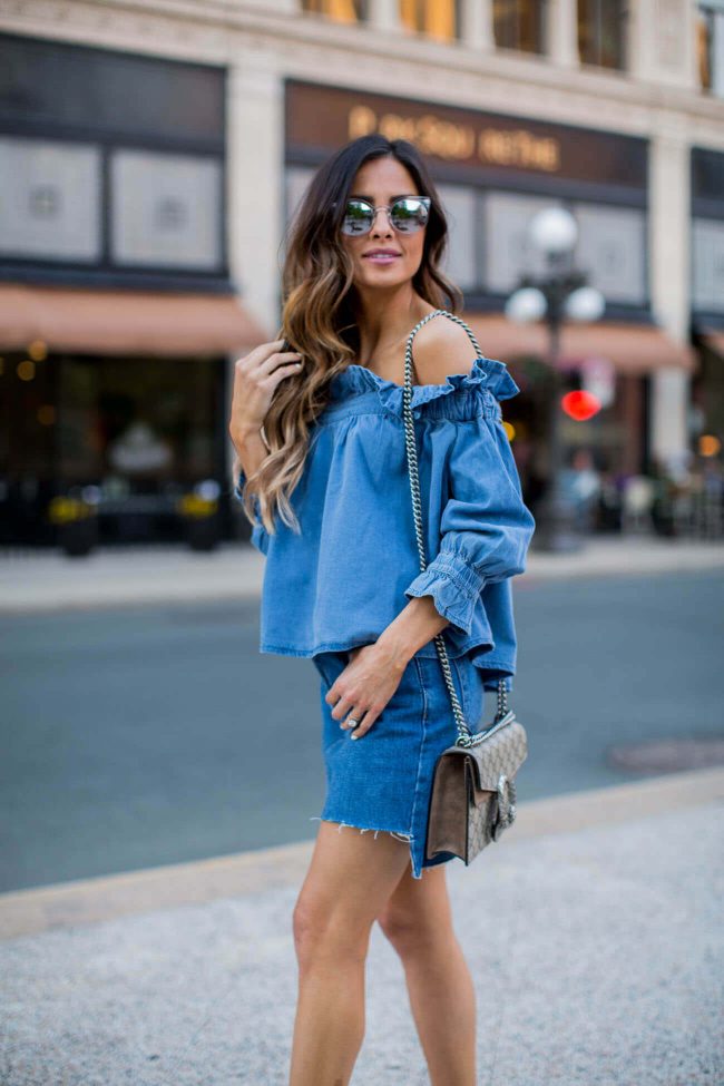 minnesota fashion blogger mia mia mine in an off-the-shoulder chambray top and denim skirt from topshop