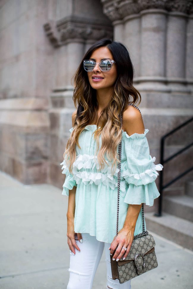 minnesota fashion blogger mia mia mine in a storets top and quay sunglasses