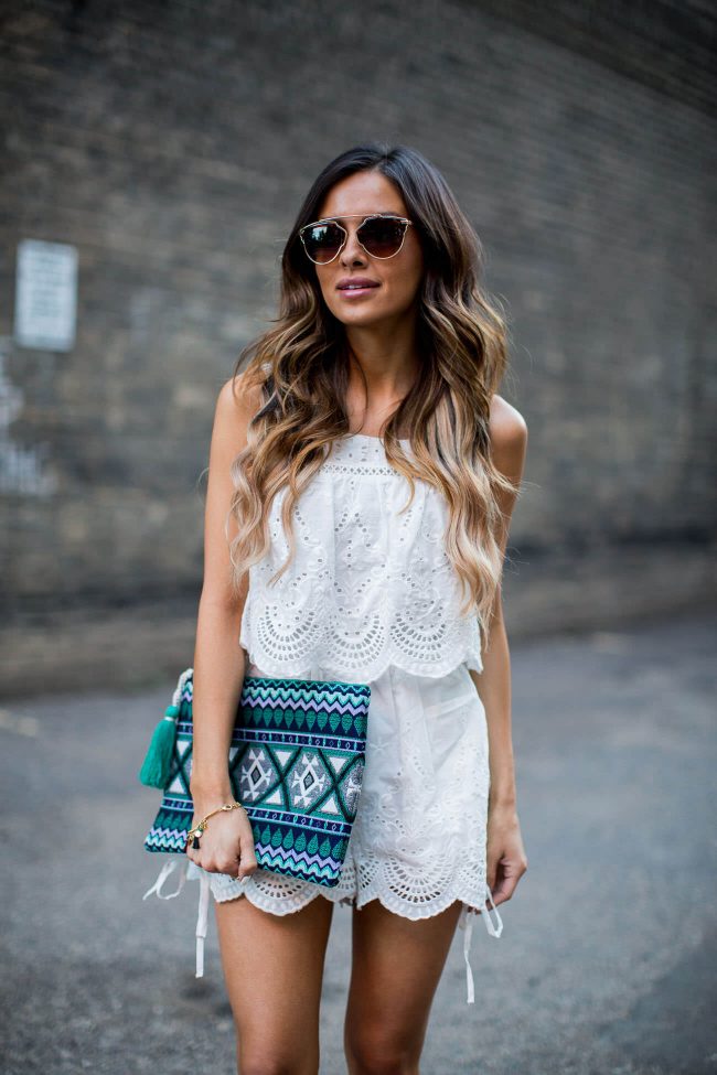 fashion blogger mia mia mine carrying an ethnic print bag by sole society
