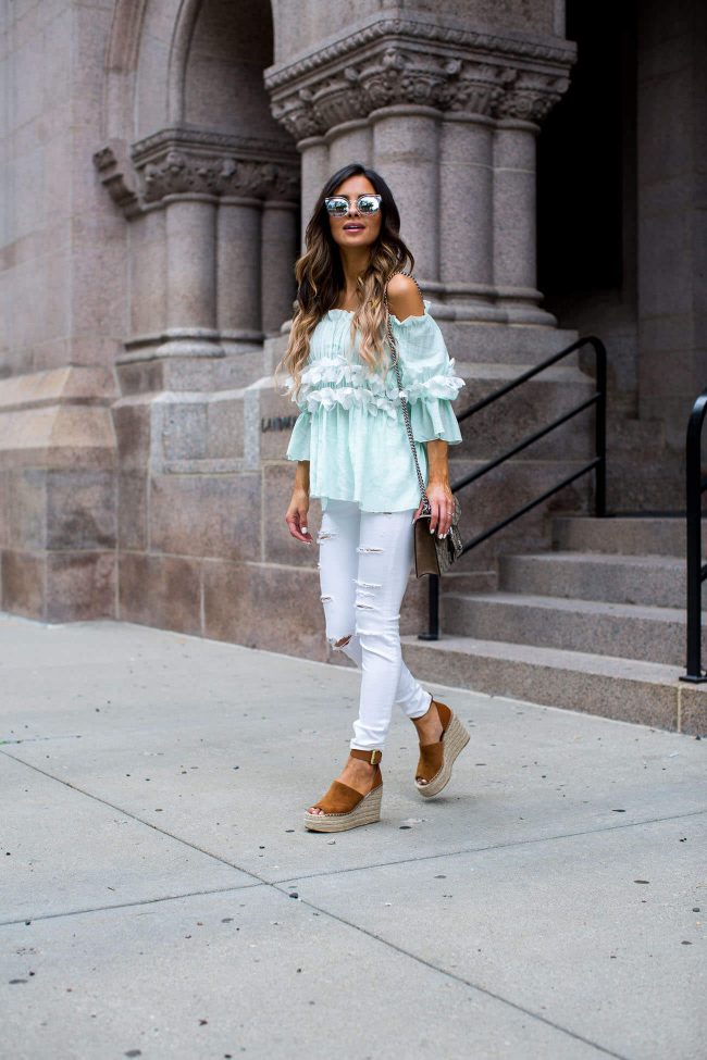 minnesota fashion blogger mia mia mine in a top from storets and white jeans from topshop