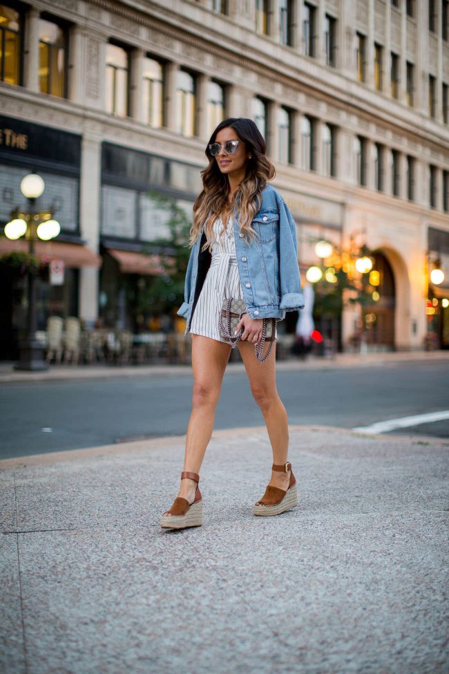 fashion blogger mia mia mine in a striped romper from nordstrom and denim jacket from topshop