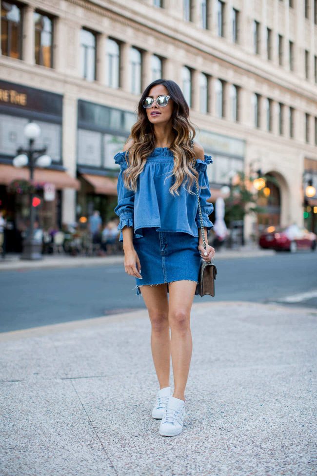 mia mia mine in a denim off-the-shoulder top and topshop skirt