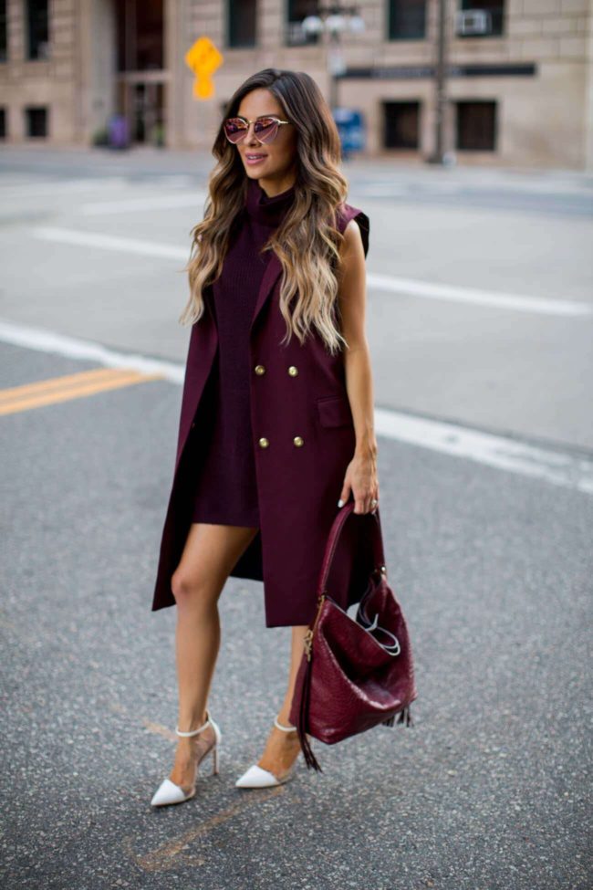 fashion blogger mia mia mine in a burgundy vest from nordstrom anniversary sale