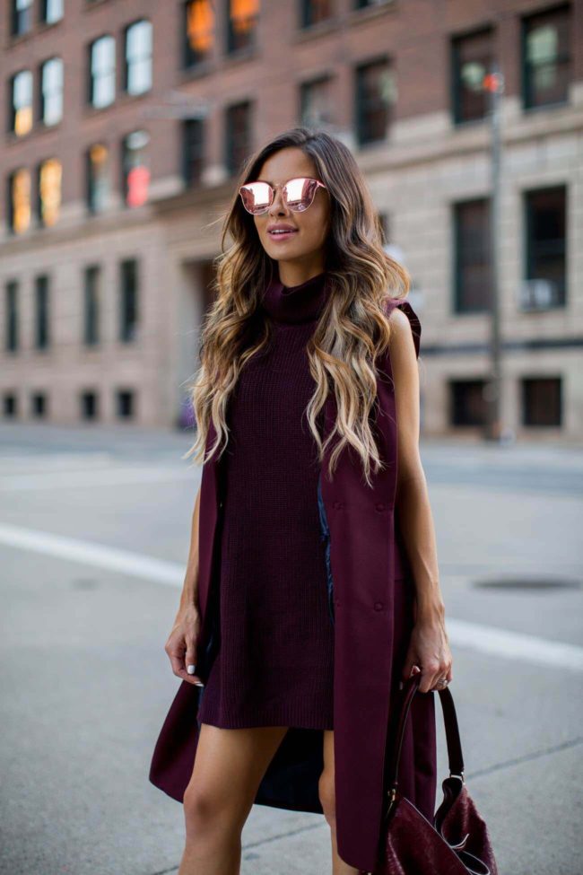 fashion blogger mia mia mine in a burgundy sweater dress from nordstrom anniversary sale
