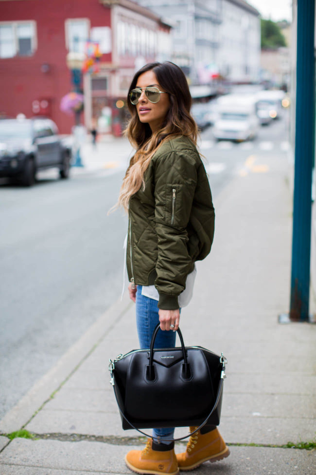 fashion blogger mia mia mine carrying a givenchy bag