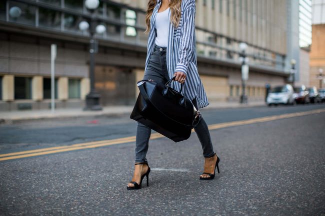 fashion blogger mia mia mine carrying a givenchy bag and wearing a topshop striped top