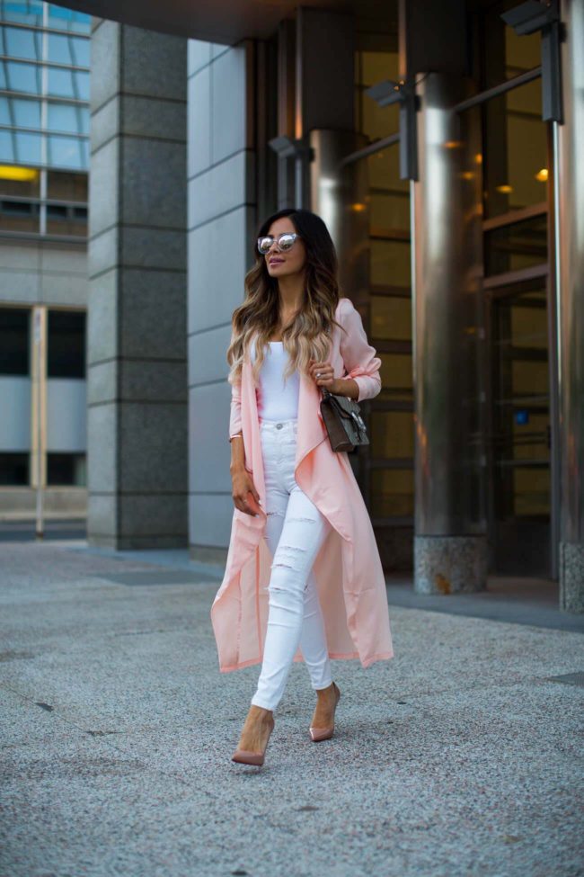 fashion blogger mia mia mine in a pink trench coat from missguided