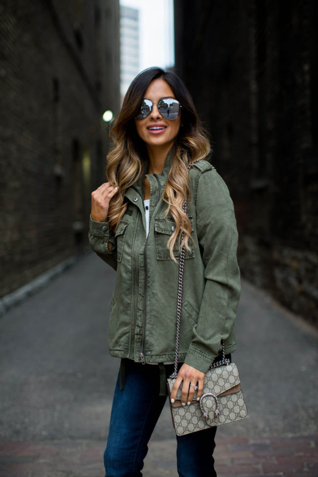 fashion blogger mia mia mine in a utility jacket from new york & company