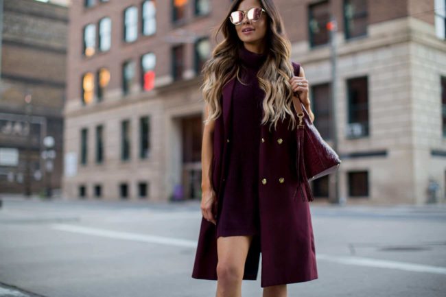 fashion blogger mia mia mine in a burgundy vest from nordstrom and zara heels