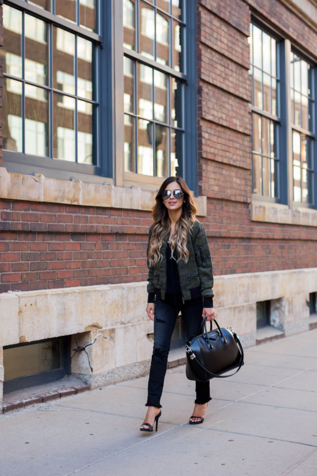 fashion blogger mia mia mine wearing a camo jacket