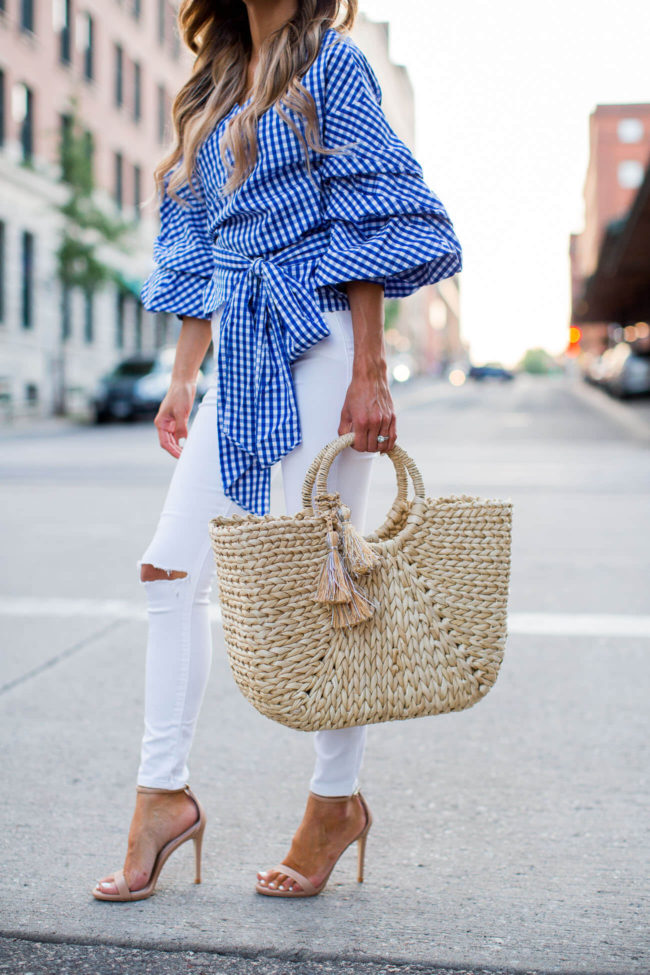 mia mia mine carrying a straw tote from shopbop
