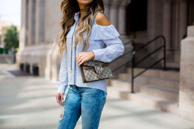 fashion blogger mia mia mine in a cold shoulder top from topshop and blanknyc jeans
