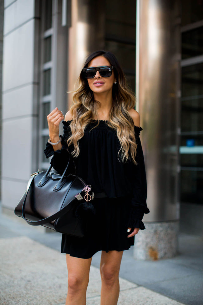 fashion blogger mia mia mine wearing a norma kamali peasant dress and givenchy bag