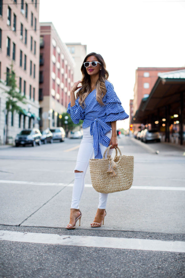 fashion blogger mia mia mine in a gingham top from shopbop and white jeans from topshop