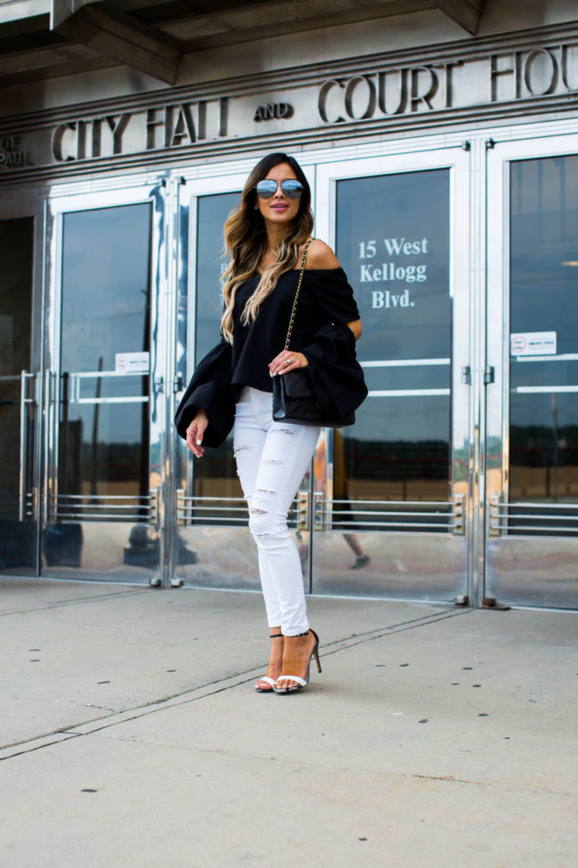fashion blogger mia mia mine wearing an off-the-shoulder top from shopbop and steve madden stecy heels