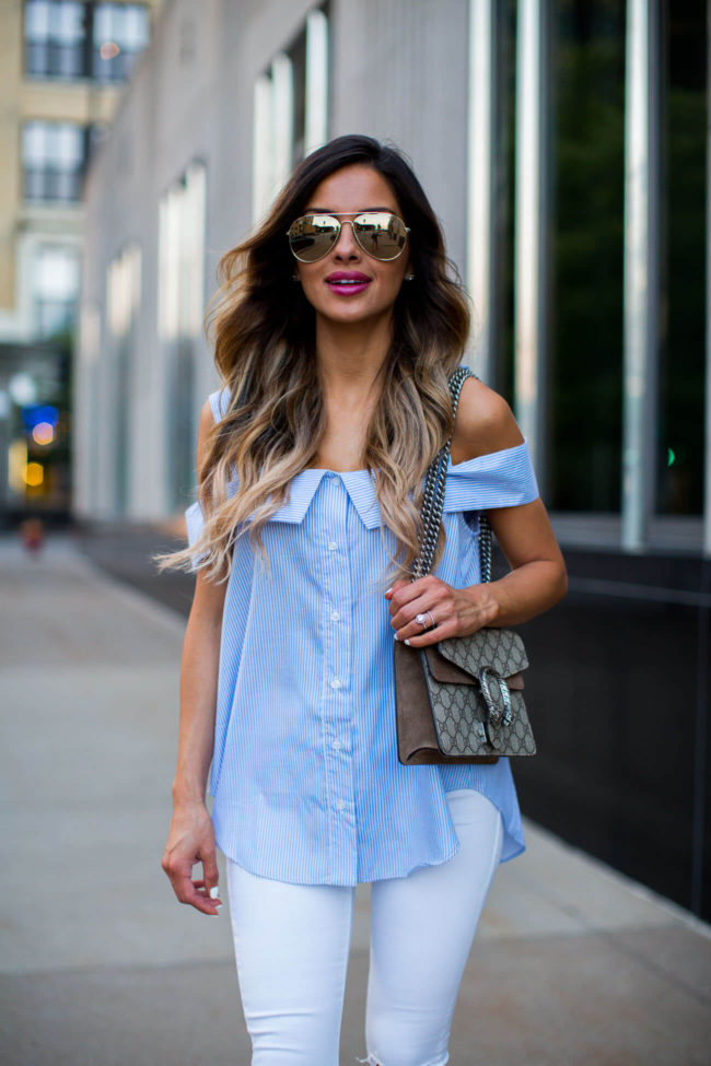fashion blogger mia mia mine in a cold-shoulder striped top and topshop white jeans