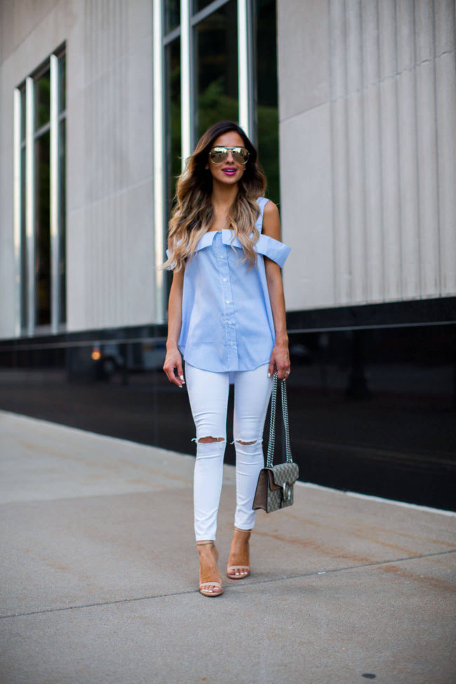 fashion blogger mia mia mine wearing a striped cold-shoulder top from shopbop