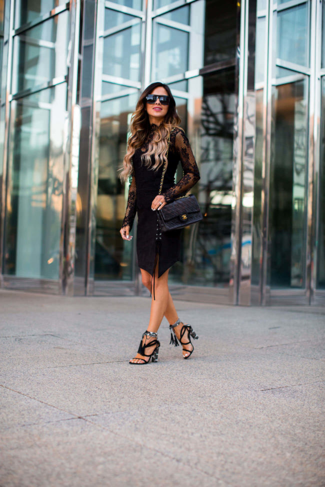 fashion blogger mia mia mine wearing a lace black top by topshop and a lace-up skirt from nordstrom