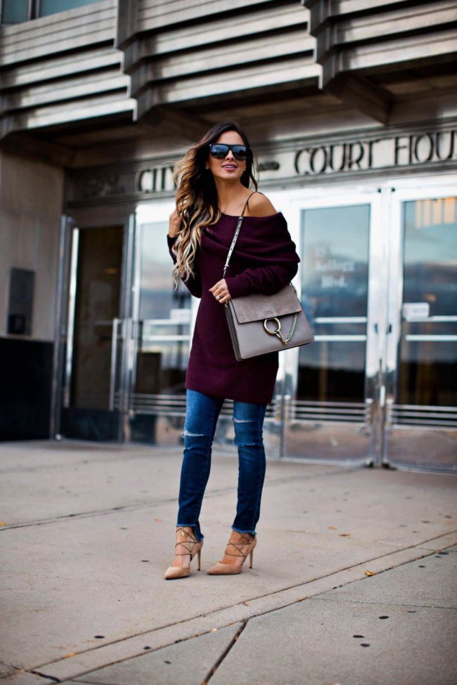 mia mia mine wearing a burgundy off-the-shoulder bag and ag jeans from nordstrom