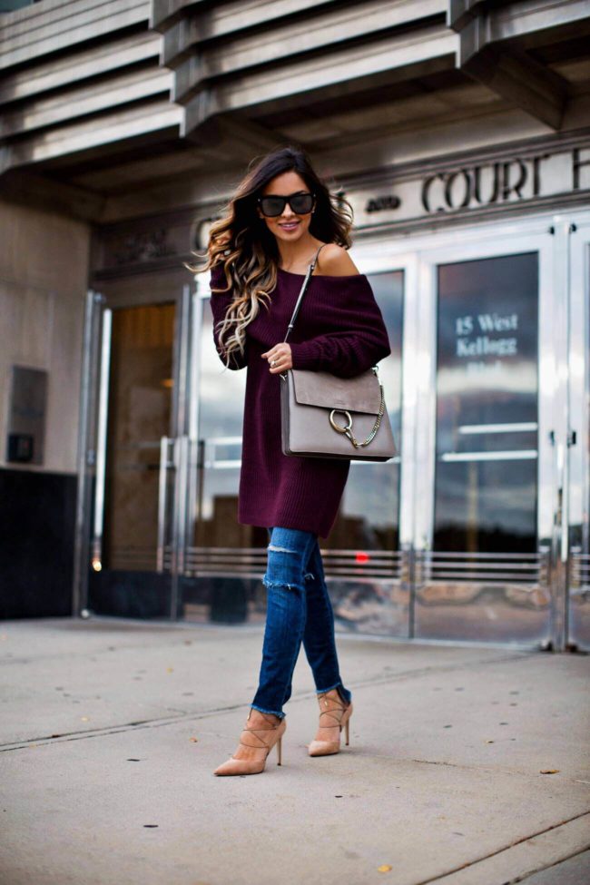 mia mia mine wearing a burgundy off-the-shoulder sweater and ag jeans from nordstrom