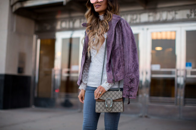 fashion blogger mia mia mine wearing a lace top from free people