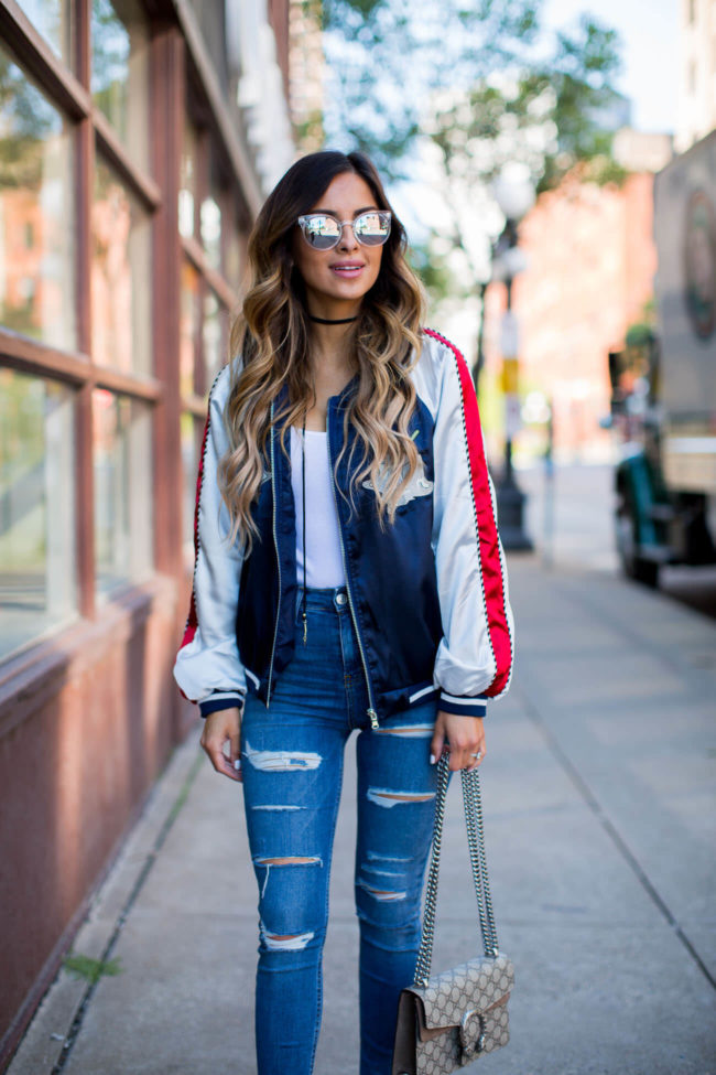 mn fashion blogger mia mia mine in a brunch bomber jacket and topshop jeans