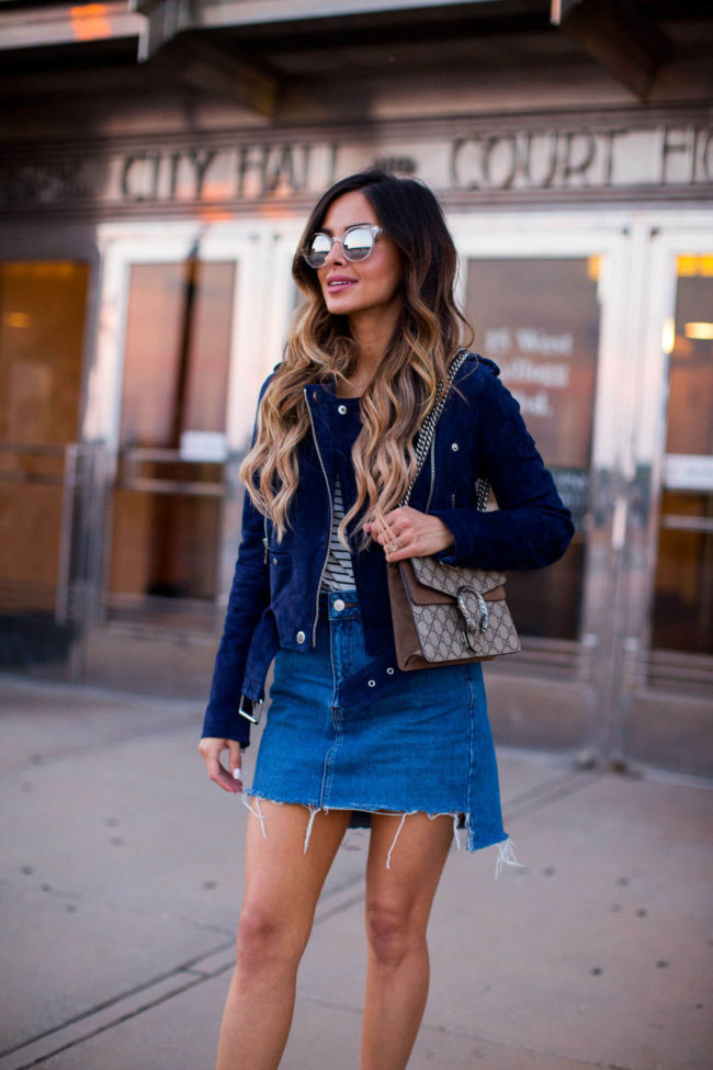 fashion blogger mia mia mine in a blue suede jacket and denim skirt from nordstrom