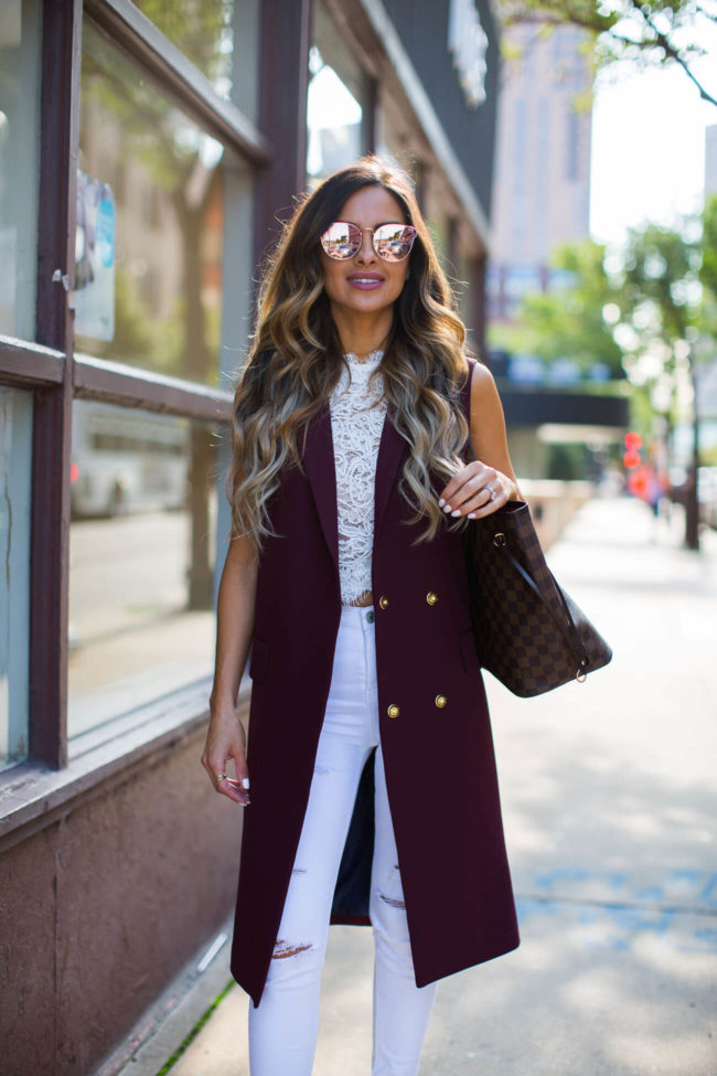 fashion blogger mia mia mine in a burgundy trench and white jeans from topshop