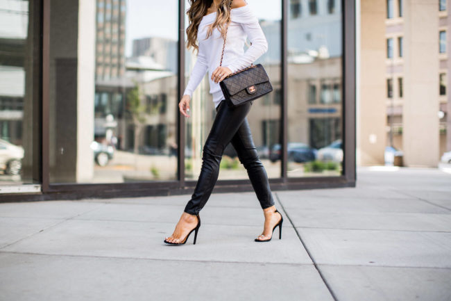 fashion blogger mia mia mine wearing clear heels from public desire and leather pants from shopbop