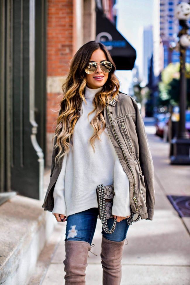 fashion blogger mia mia mine wearing a white turtleneck sweater from missguided and a gold aviator sunglasses by le specs