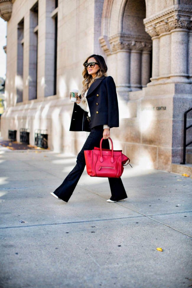 fashion blogger mia mia mine in flare jeans from banana republic and a celine bag