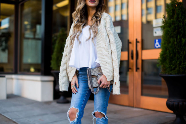 fashion blogger mia mia mine wearing an ivory cable knit sweater from chicwish