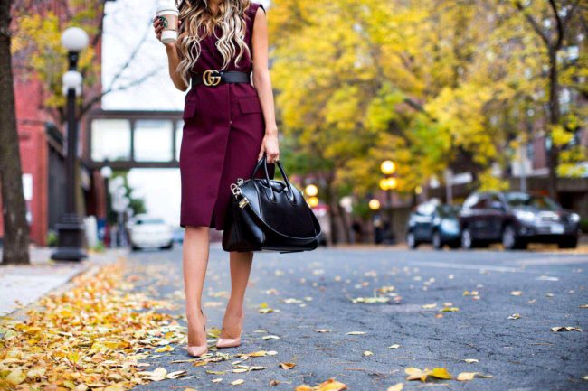fashion blogger mia mia mine wearing a burgundy topshop sleeveless blazer and a gucci belt from nordstrom